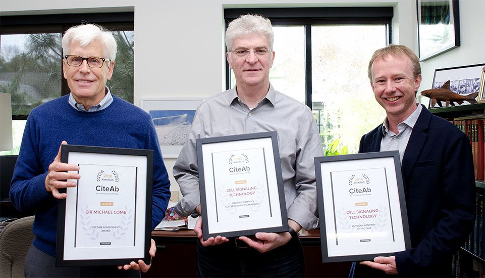 Photo of Dr Michael Comb and Roberto Polakiewicz from CST with Andrew
        Chalmers from CiteAb holding the awards placards that CST won in 2018.